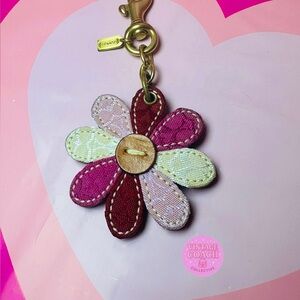 Coach daisy charm